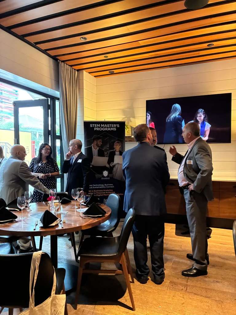 Business leaders networking during an exclusive leadership conversation in Brickell