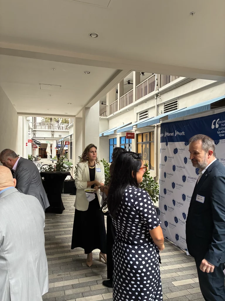 Attendees engaging in a leadership dialogue on AI, strategy, and organizational transformation